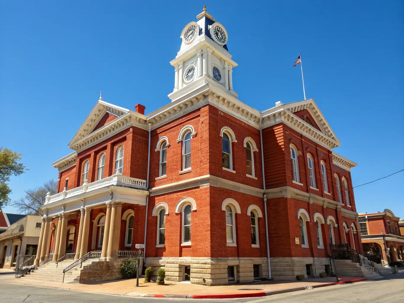 A photograph of the restored Old Town Hall in Cusset, highlighting its architectural details and historical significance, with community members visible in the foreground, enjoying the revitalized space.